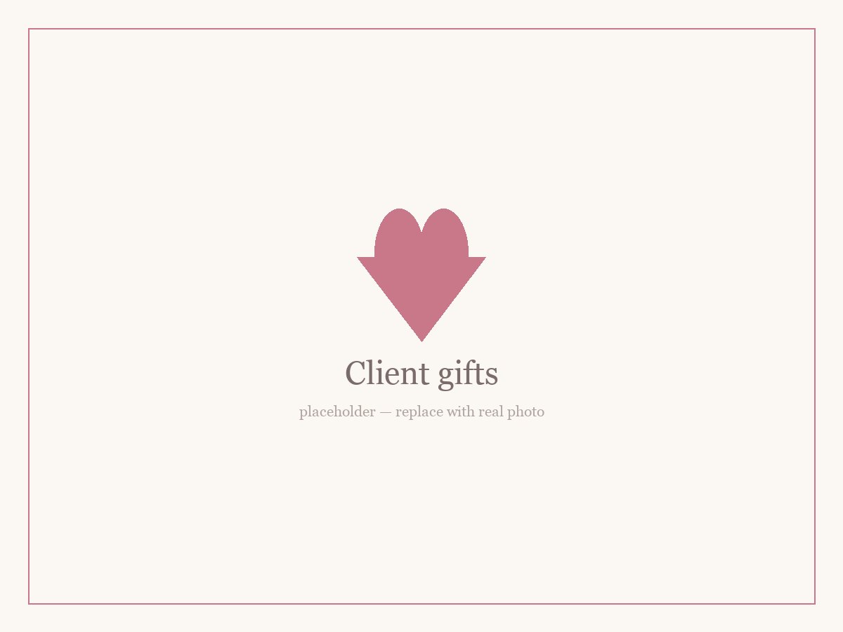 Branded corporate client gifts including embroidered pouches and totes with a company logo
